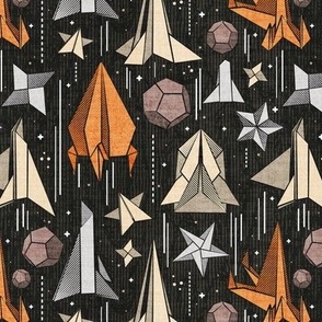 Small scale // Reaching for the stars // black background ivory grey brown and orange origami paper asteroids stars and space ships traveling light speed