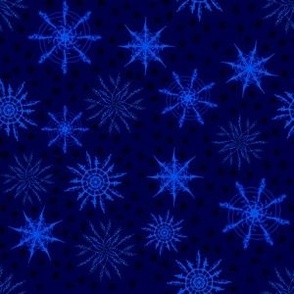 Midnight snowflakes illuminated on deep blue