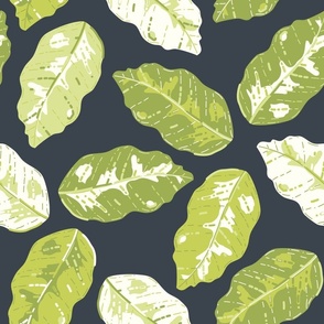 Wild Lime Green Dieffenbachia Leaves on Ink Blue seamless pattern