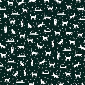 cats and stars on dark green