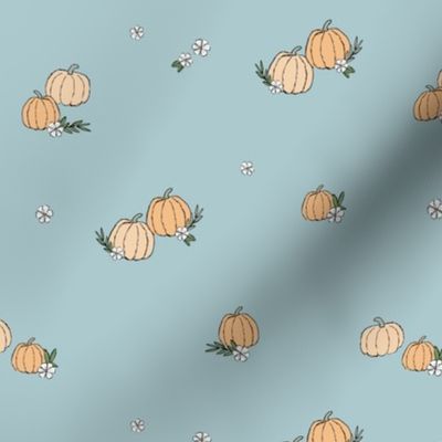 Boho fall pumpkins and flowers with vines and leaves garden halloween spaced design pastel vintage peach orange on blue