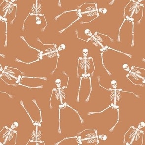 Day of the dead - Realistic skeleton freehand sketched bones on burnt orange