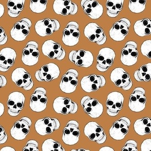 Day of the dead - Skulls freehand sketched realistic bones skull design on burnt orange
