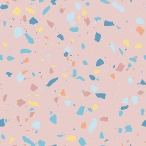 Pastel blue and yellow terrazzo spots on Pink