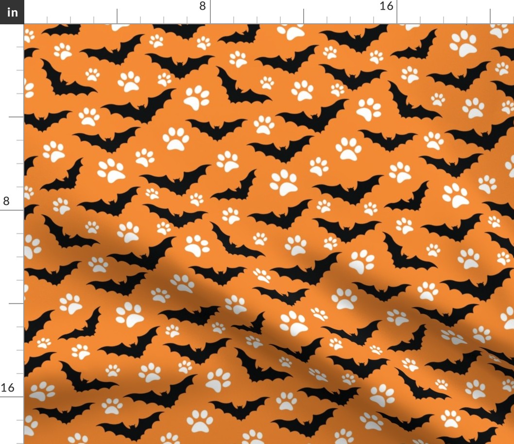 halloween orange bat dog paw print pattern