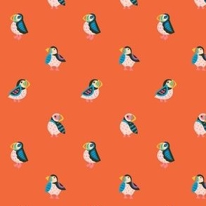 Little puffins on orange