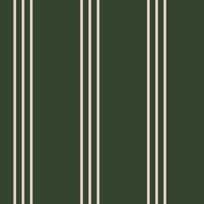 The minimalist classic triple stripes cottage country mudcloth style abstract baby nursery design in ivory on pine green christmas winter