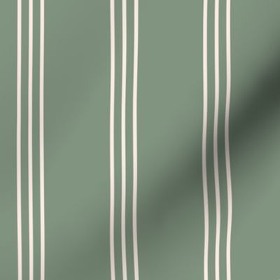 The minimalist classic triple stripes cottage country mudcloth style abstract baby nursery design in vintage sage green ivory