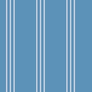 The minimalist classic triple stripes cottage country mudcloth style abstract baby nursery design in sky blue ivory