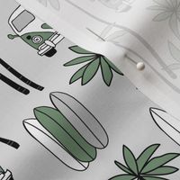 Palm tree island surfing trip summer vacation hippie van and surf boards olive green gray
