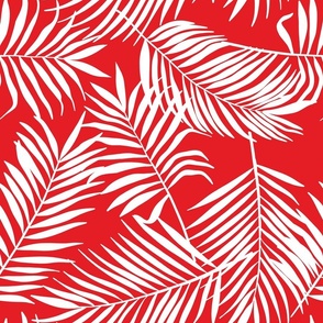 palm leaves on bright red