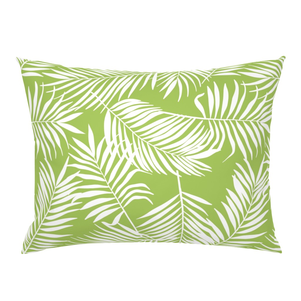 palm leaves on bright green