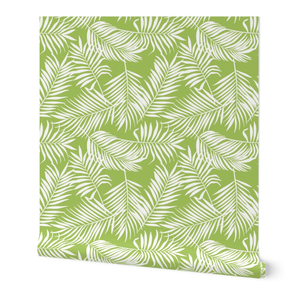 palm leaves on bright green