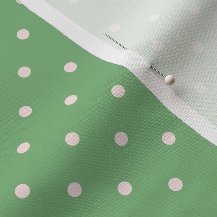 mini pink polka dot on an apple green background