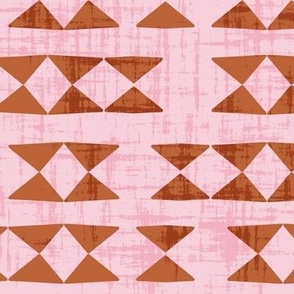 geo triangles - terracotta on pink