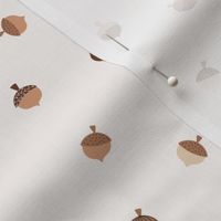 Little minimalist Scandinavian style acorns autumn garden theme matching our squirrels woodland for kids neutral earthy tones on ivory white 