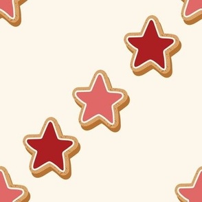 Large Diagonal Christmas Diagonal Gingerbread Red and Pink Star Cookies with Seashell White Background