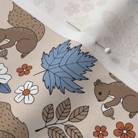 Woodland animals autumn garden red squirrels and leaves acorns and flowers fall kids design orange blue periwinkle on tan beige