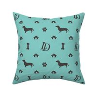 Louis Luxury Monogram Mini Dachsunds on Aqua Fabric with Black