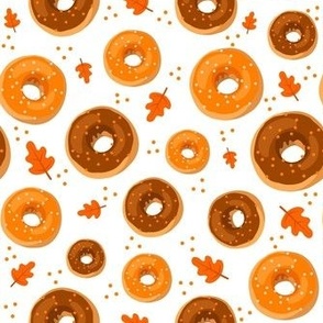 Medium Scale Frosted Pumpkin Spice and Maple Frosted Sprinkle Donuts on White