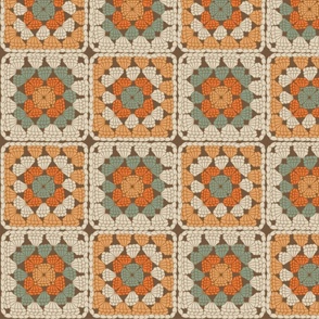 Traditional crochet granny square in retro color palette.