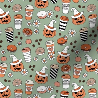 Pumpkin spice and halloween witch fall coffee cups to go boho cutesie vintage drinks and daisies autumn blossom orange peach beige on sage green