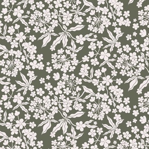 Ditsy White Blooms on a dark green background