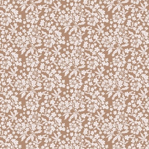 Ditsy White Blooms on a pastel brown background