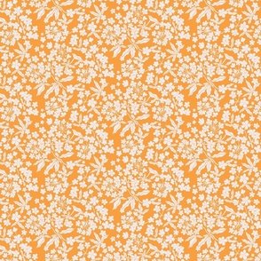 Ditsy White Blooms on an orange background