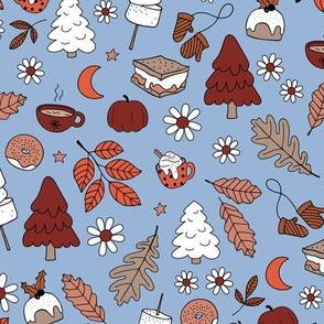 Vintage winter wonderland leaves moon stars autumn smores marshmallows snacks and pumpkin spice coffee and christmas pudding and trees orange rust red on blue