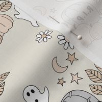 rest in peace cutesie tombstone graveyard halloween ghosts and pumpkins moon stars and daisies beige sand gray neutral vintage seventies palette