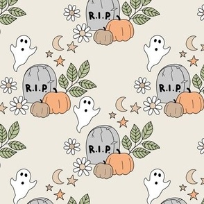 rest in peace cutesie tombstone graveyard halloween ghosts and pumpkins moon stars and daisies orange green gray on beige sand