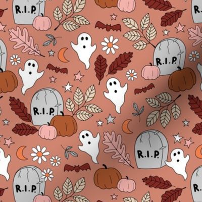 Cutesie tombstone graveyard - rip halloween ghosts and pumpkins moon stars and daisies seventies orange pink blush burgundy on moody coral