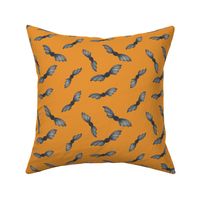 Hand painted Halloween bats in grey on orange for kids clothing and accessories