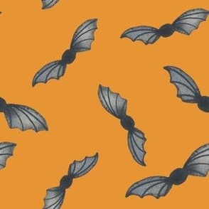 Hand painted Halloween bats in grey on orange for kids clothing and accessories