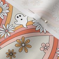 Groovy ghosts and rainbows sunflower and daisies spooky autumn funky halloween design pink orange yellow on sand 