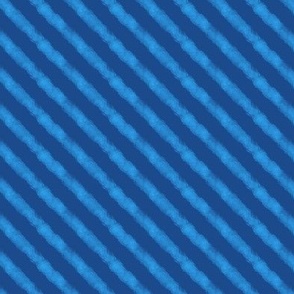 diagonal cloud stripes - skyblue on blue