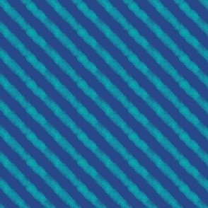diagonal cloud stripes - teal on blue
