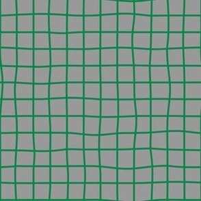 Whimsical dark green Grid Lines on a medium gray background