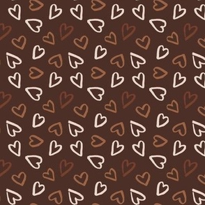 Neutral valentines day earth tone hearts on chocolate brown