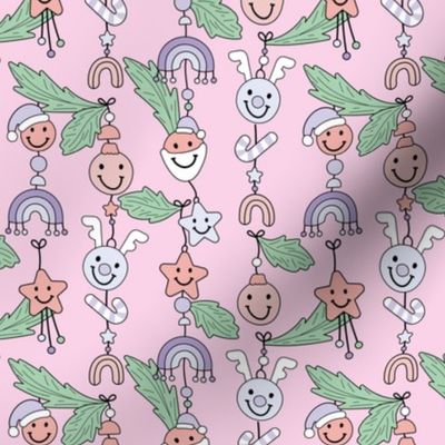 Cozy Christmas kawaii decoration - Happy holidays seasonal smiley design with raindeer bells stars rainbows and christmas ornaments hanging on branches girls pink lilac mint