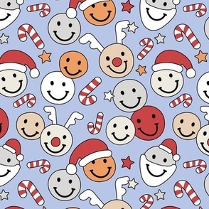 Happy Holidays candy canes - Christmas smiley stars santa hats reindeer and stars red orange pink on cornflower blue