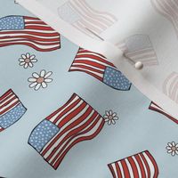 American vintage union jack flag - freehand drawn usa flags patriot design with daisies on baby blue
