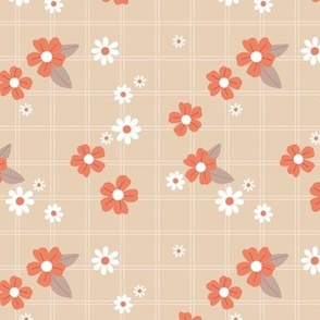 White flowers and daisies on vintage seventies picnic winter plaid sand orange beige