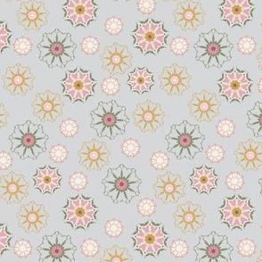 Small Winter Snowflakes in Pink , Green, and Gold on Blue Gray 