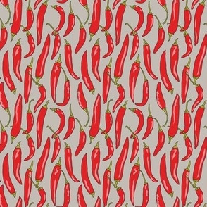 tiny red chili peppers on linen