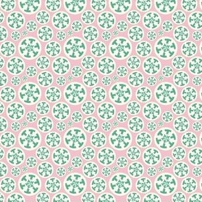 Bright modern cog circle pattern in pink, white, and green