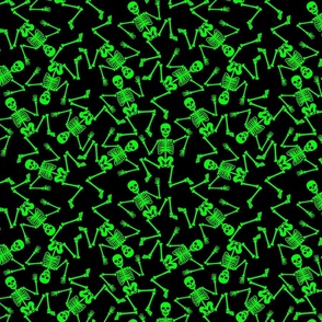 Small Bright Green Dancing Halloween Skeletons Scattered On Black