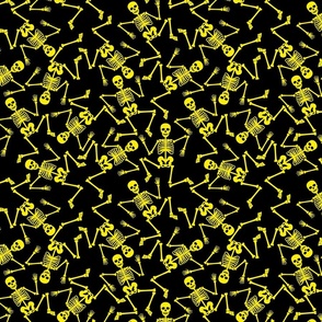 Small Bright Yellow Dancing Halloween Skeletons Scattered On Black