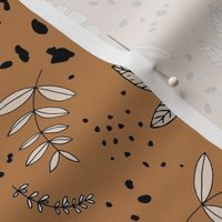 Jungle leaves and cheetah spots tropical monstera branches and botanical plants natural earthy boho theme nursery freehand gray neutral beige on burnt orange